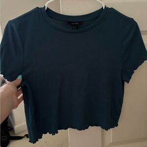 •dark blue/teal top